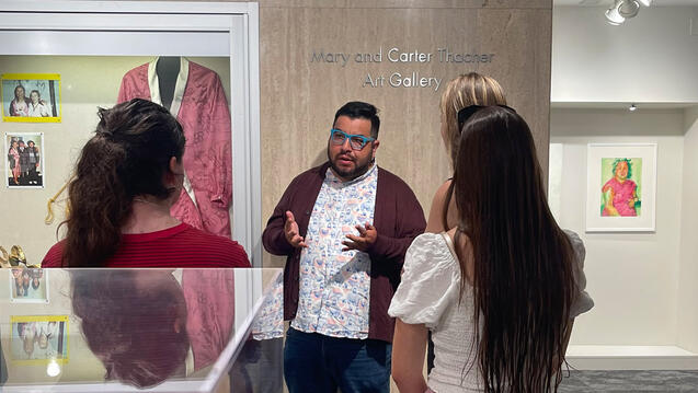 A person talking at the Thacher Art Gallery