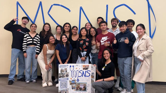 Male Student Nurses Society (MSNS) smiling and posing
