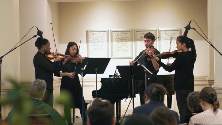 Students chamber quartet performing 