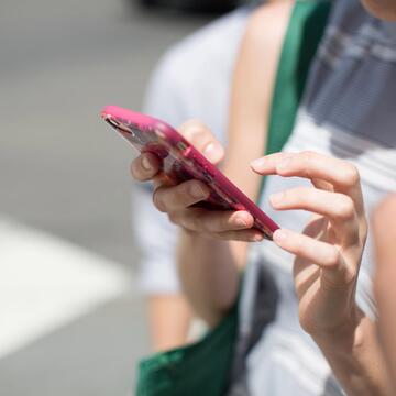 Hands holding phone