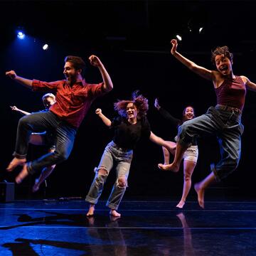 Students dancing in a performance