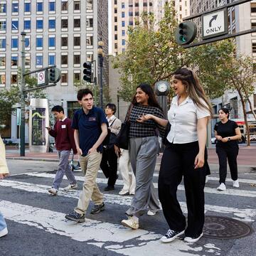 Group of students crossing street in Financial District