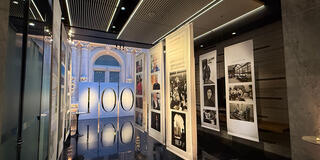 Conservatory at One Sansome hallway with SOM history banners hanging