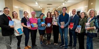 Professors with their books